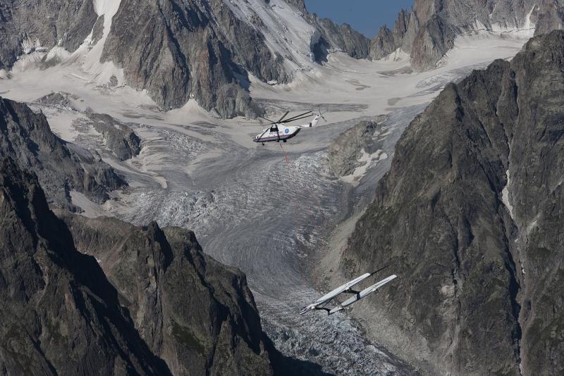 Alinghi 5 flying two hulls through the mountains